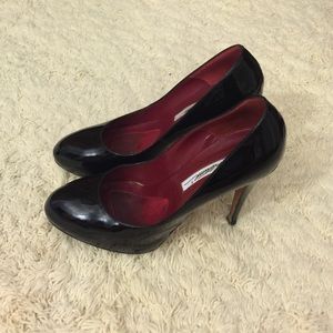 Brian Atwood black patent leather pumps